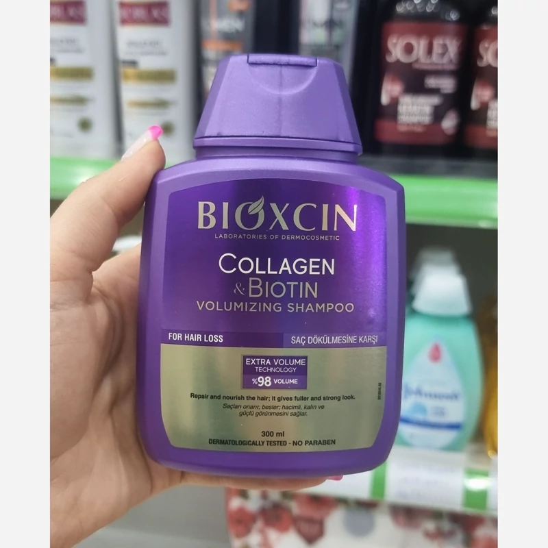 شامپو کلاژن بیوکسین بنفش ضدریزش مناسب انواع مو